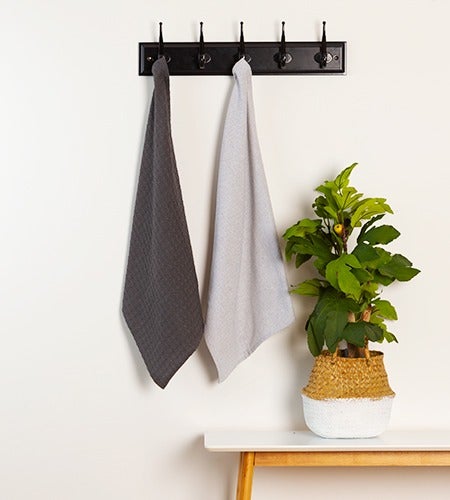 GREEN ELEMENTS recycled tea towels hung to dry